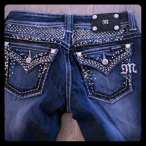 Blinged out barely worn miss me jeans.